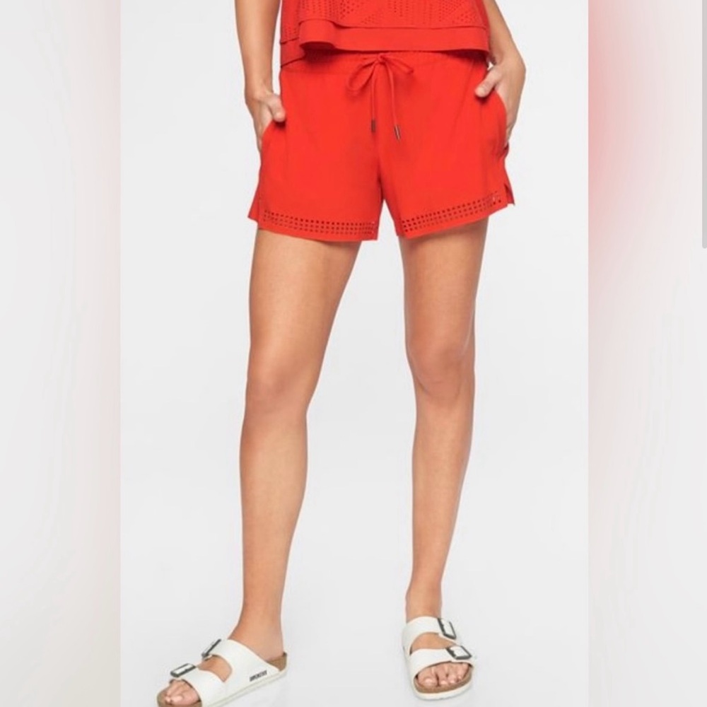 Athleta Baja Shorts. Pull on/drawstring waist & laser cut details. Size 10. EUC.